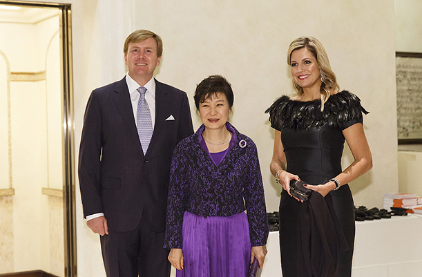 Attending Performance and Reception Hosted by Dutch King and Queen