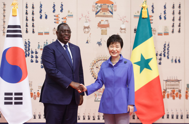 Senegalese President Macky Sall Signing the Guestbook and Taking Commemorative Photo