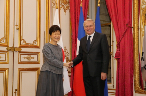 Attending a Dinner Hosted by French Prime Minister Jean-Marc Ayrault 